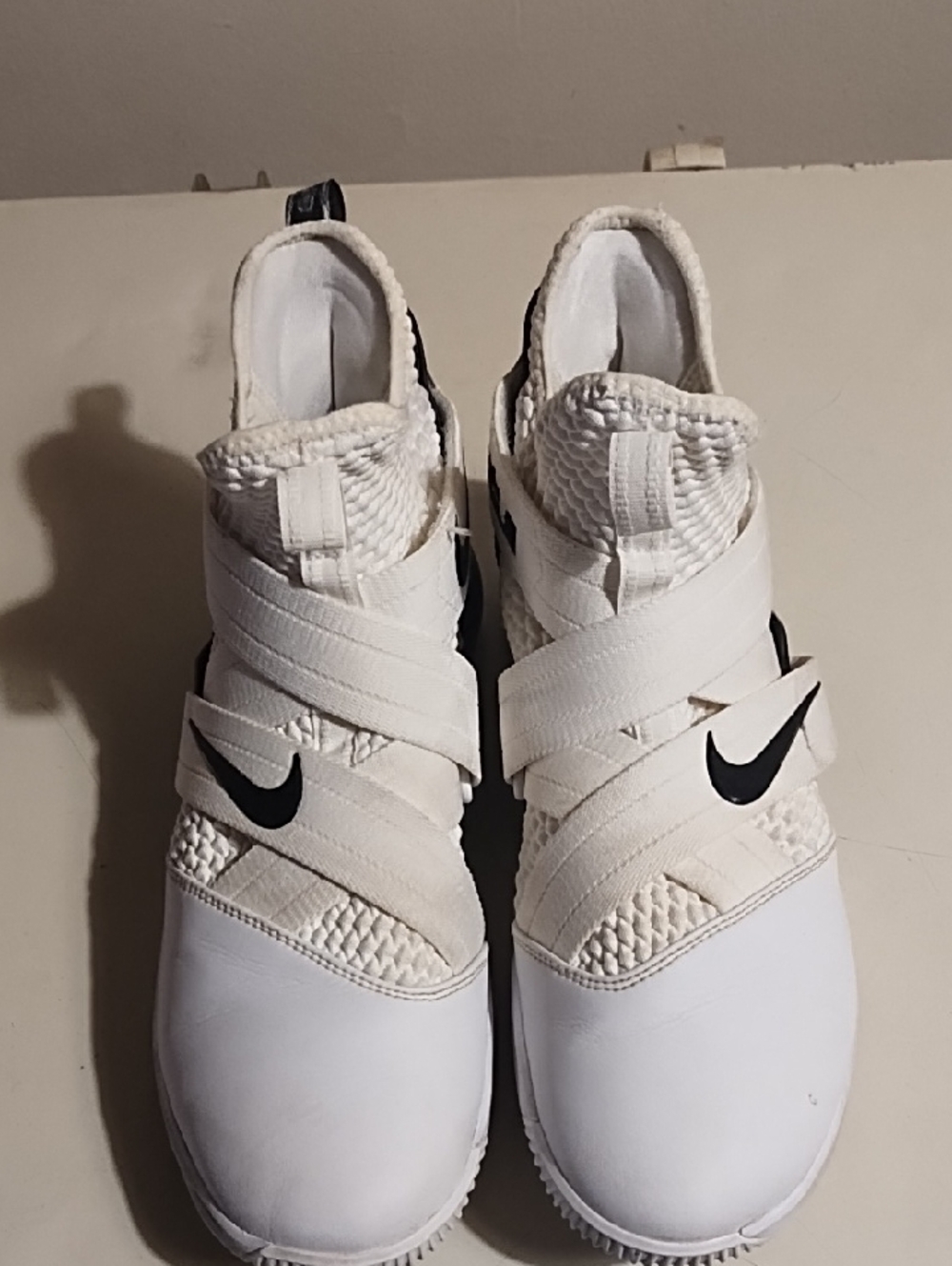 Nike White Sneakers with Black Swoosh and Wrap Straps